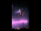 Epic lightning during firework display captured in slow motion.
