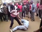 Silly Tout who wanted to strip woman Naked in Kenya , Beaten senselessly by the same lady