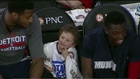 Young fan makes casual conversation with Drummond on Pistons bench