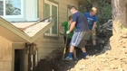 California towns dig out after weekend mudslides