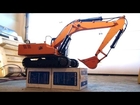 RC ADVENTURES - Hydraulic Excavator Lifts Itself Up - 1/12th scale 4200xl Earth Digger - RC4WD