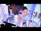 stock footage student doctors examining medical specimens in sterile laboratory conditions