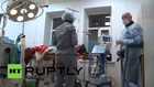 Ukraine: Donetsk doctors treat football shelling victims