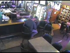 Surveillance video shows robbery at Tap Inn