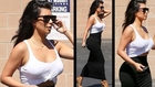 Kim Kardashian Sizzles In White Crop Top And Tight Skirt On A Sunny Day